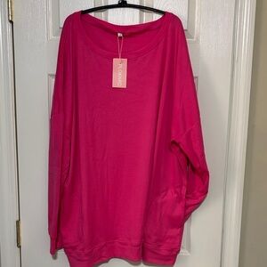 Super soft pink top with side pockets